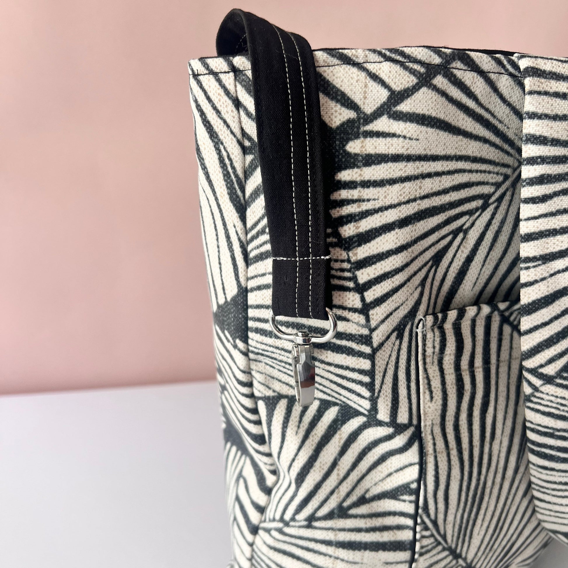 black tote bag interior with double pocket and key cord