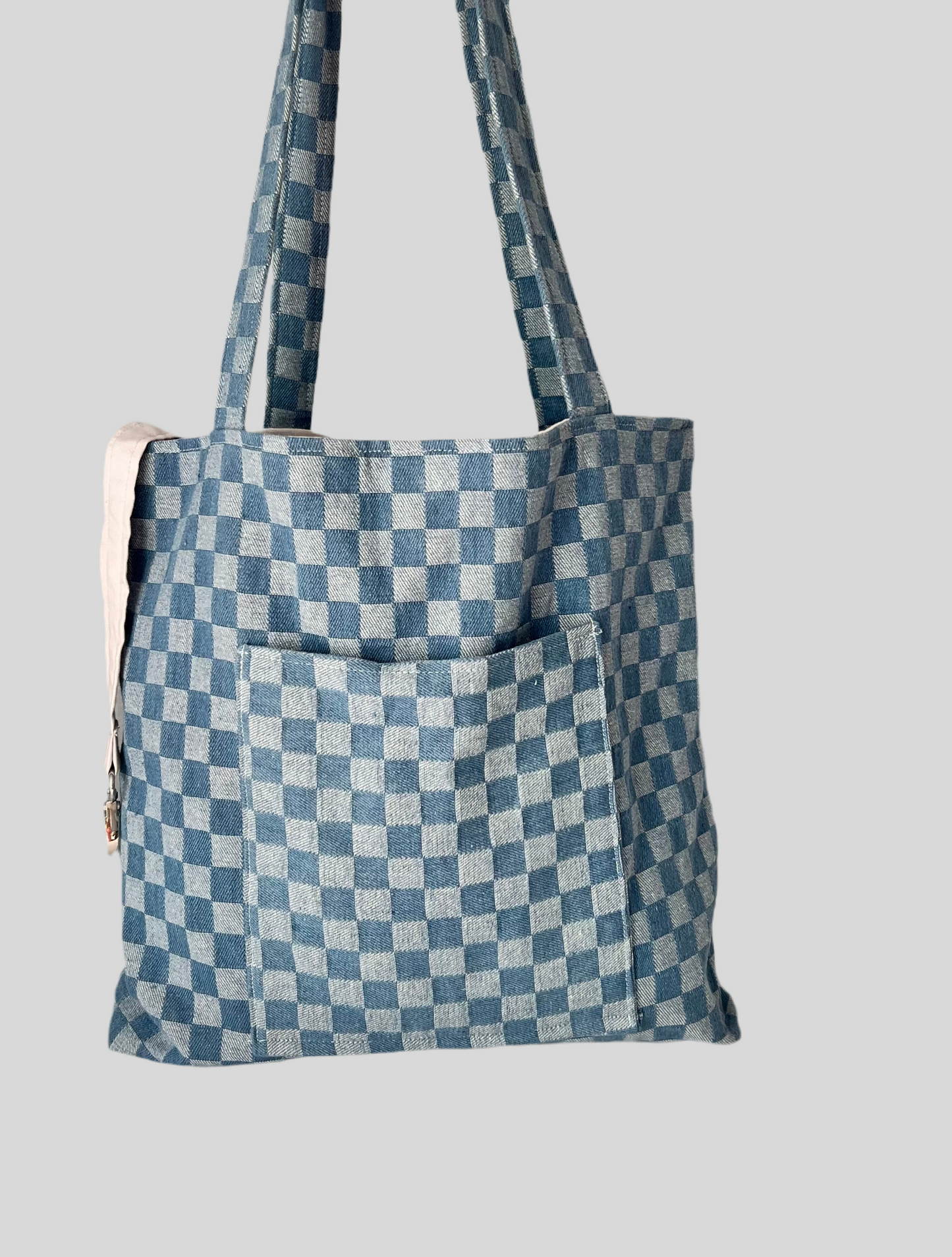 blue checkered tote bag with gray cotton lined interior