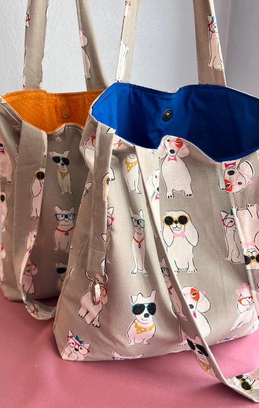 handmade dog print tote bag with cartoon dogs wearing glasses