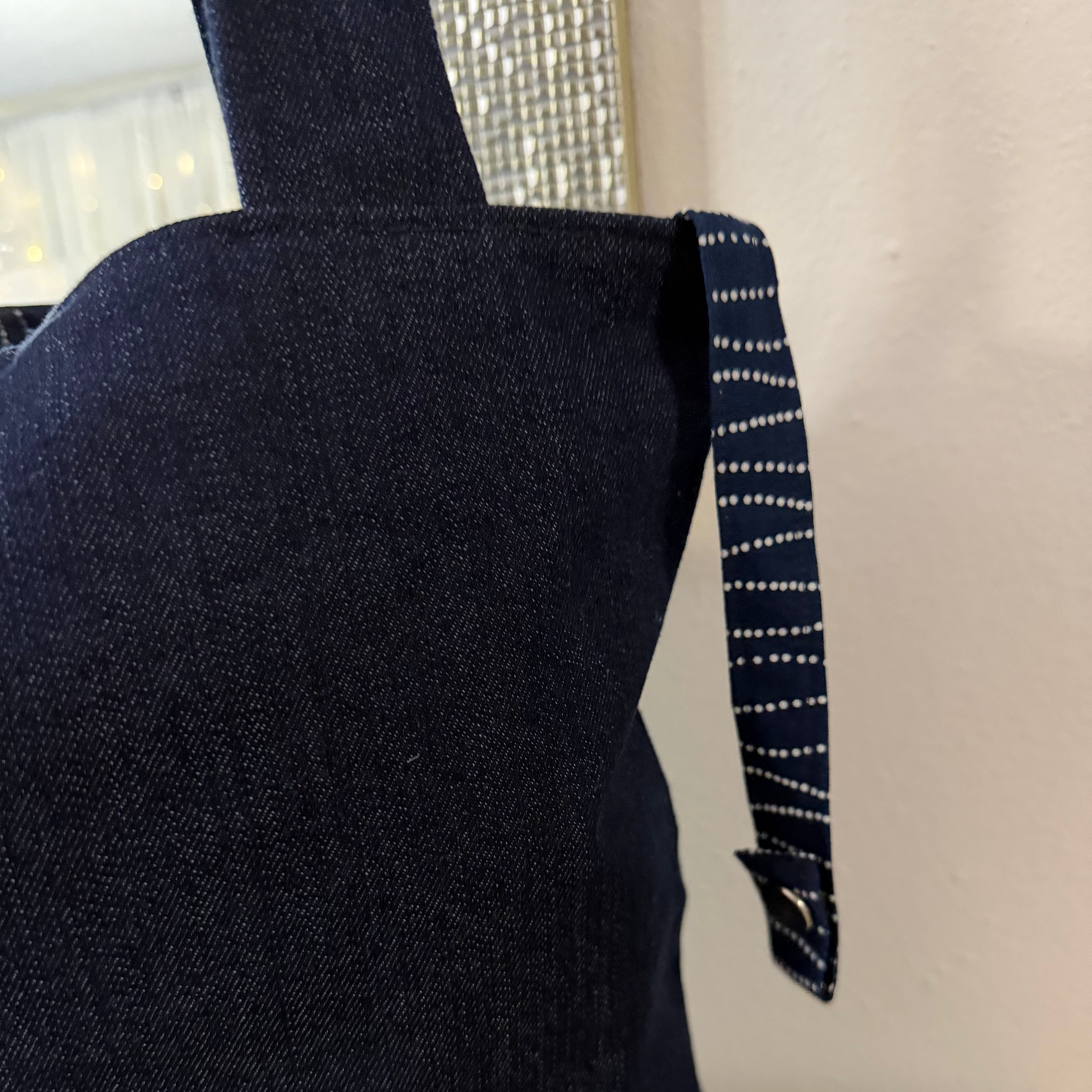 keychain cord inside blue denim tote bag