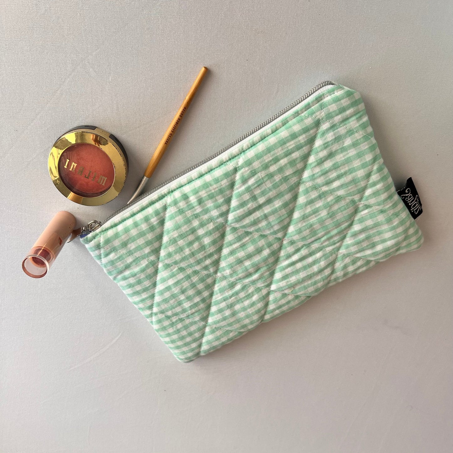 light green gingham makeup bag with quilted cotton exterior