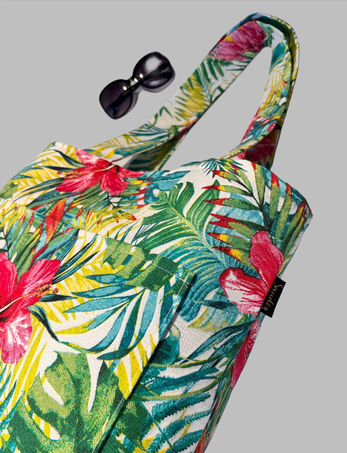 sunglass and large handmade pool bag with tropical floral pattern